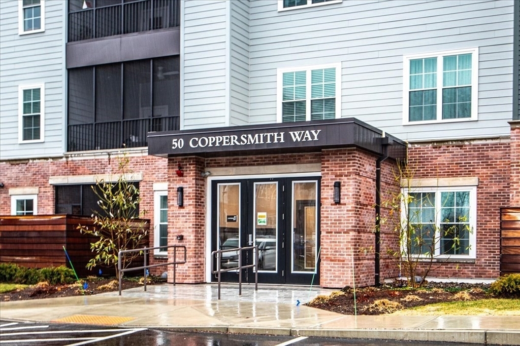 Property Photo: 50 Coppersmith Way 5-312 MA 02021