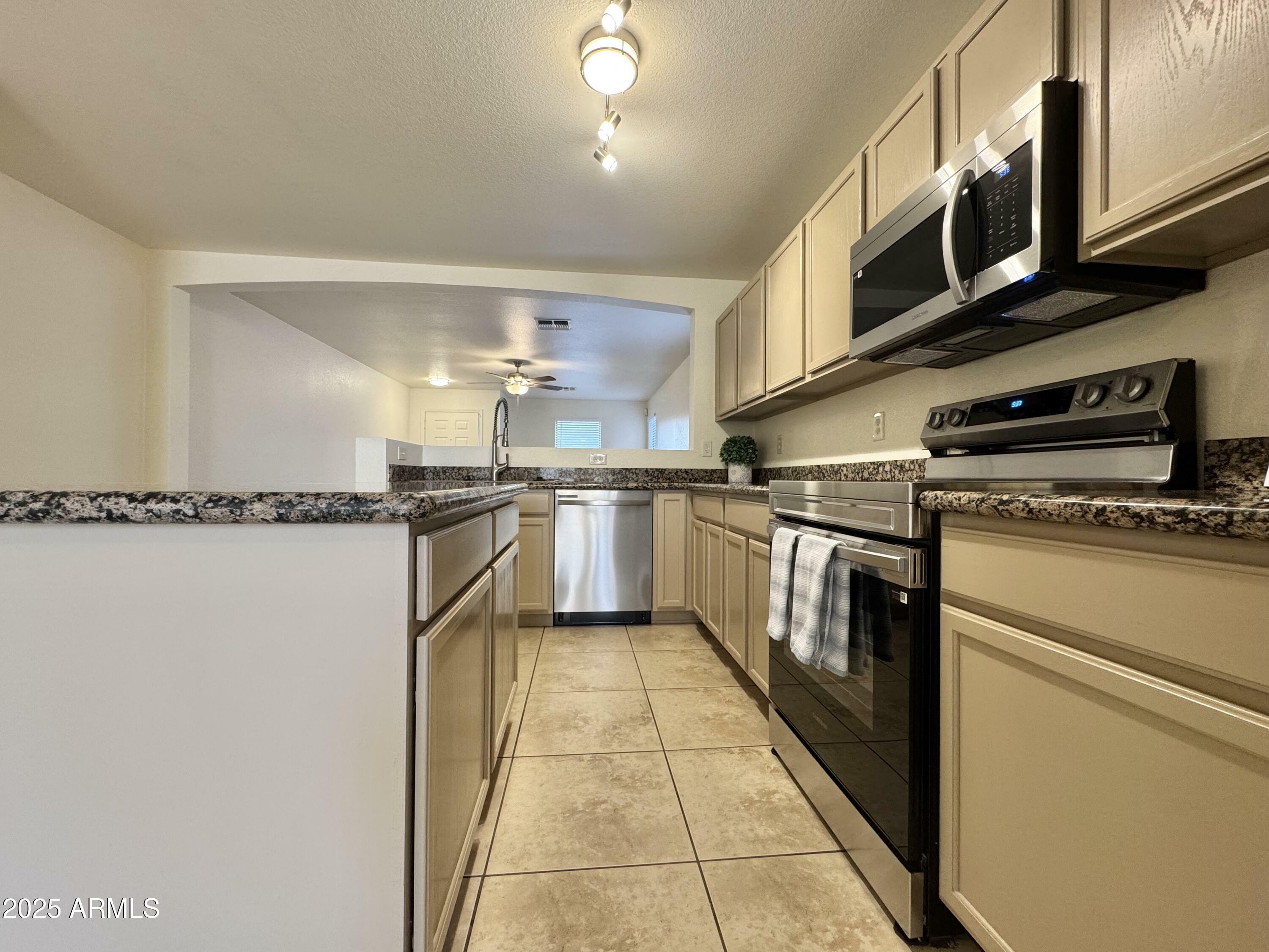 Property Photo: 1791 N 94th Avenue AZ 85037