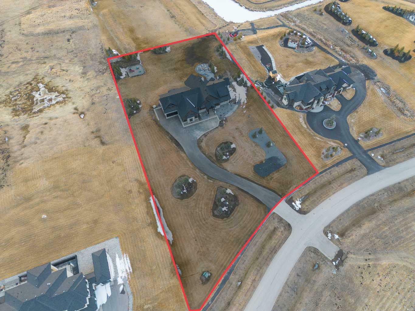 Property Photo: 11 Windhorse Green AB T3Z 0B4
