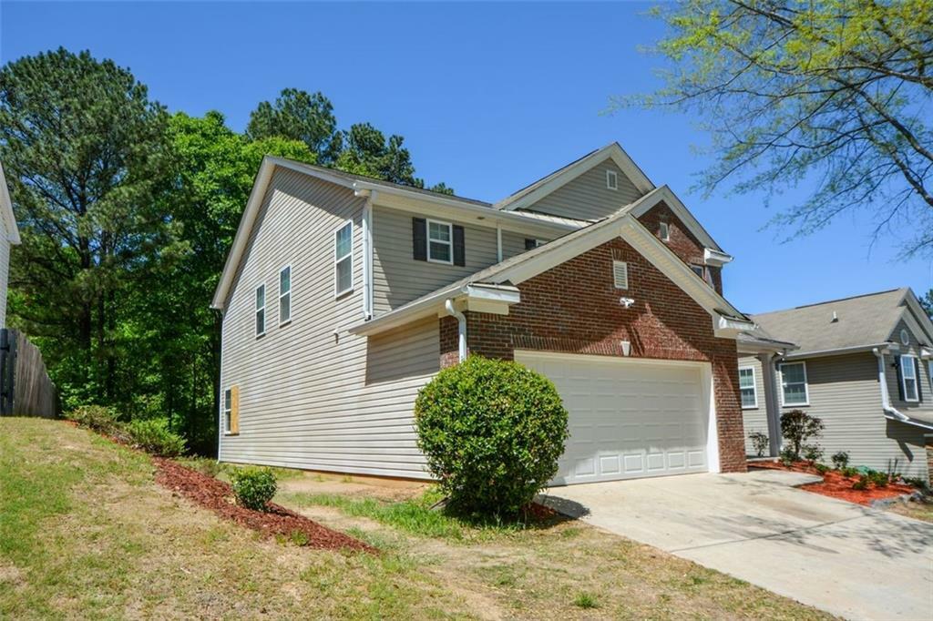 Property Photo:  5660 Sable Bay Point  GA 30349 