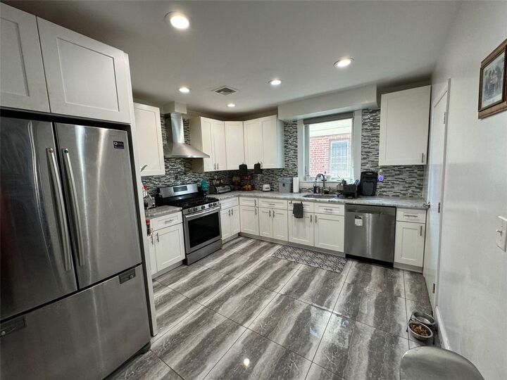 Property Photo:  11583 220th Street  NY 11411 