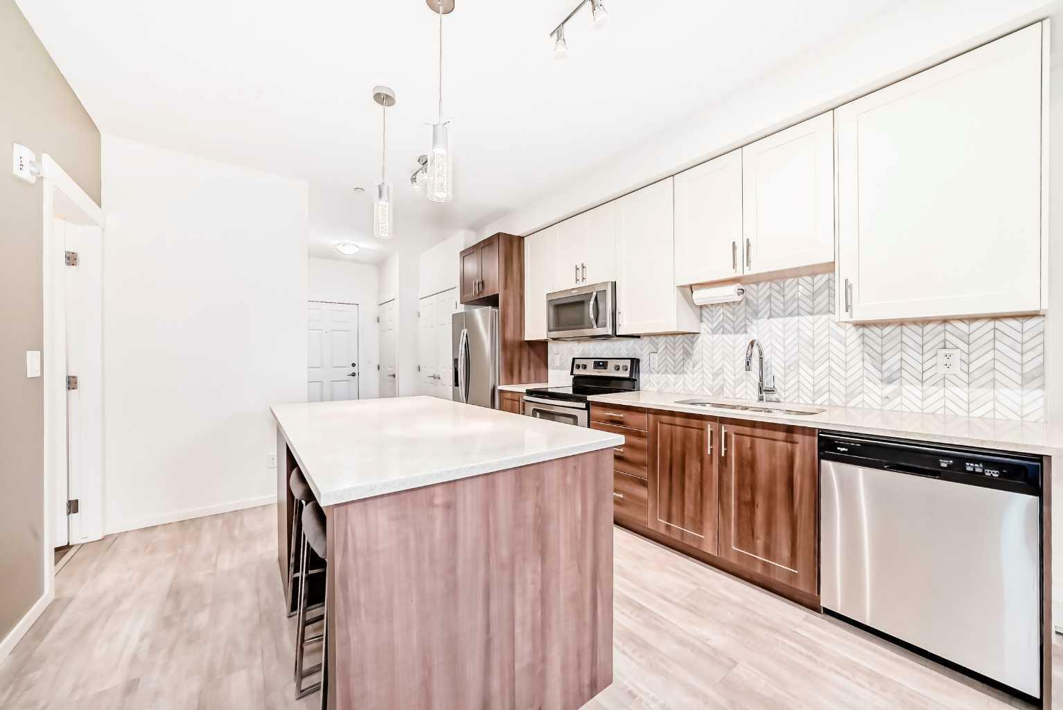 Property Photo: 215 Legacy Boulevard SE 4317 AB T2X 3Z4