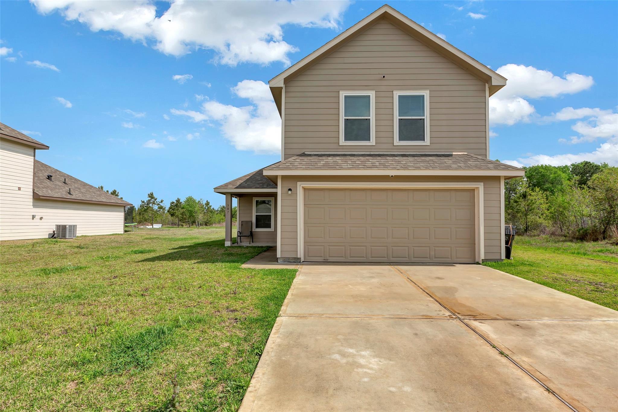 Property Photo: 307 Road 5138 TX 77327