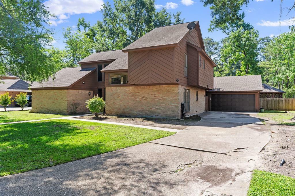 Property Photo: 309 S Rivershire Drive TX 77304