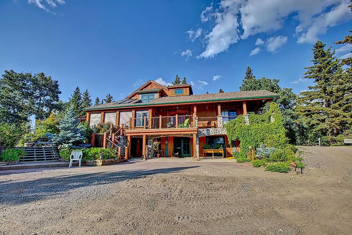 Property Photo: 242075 1280 Drive W AB T0L 1K0