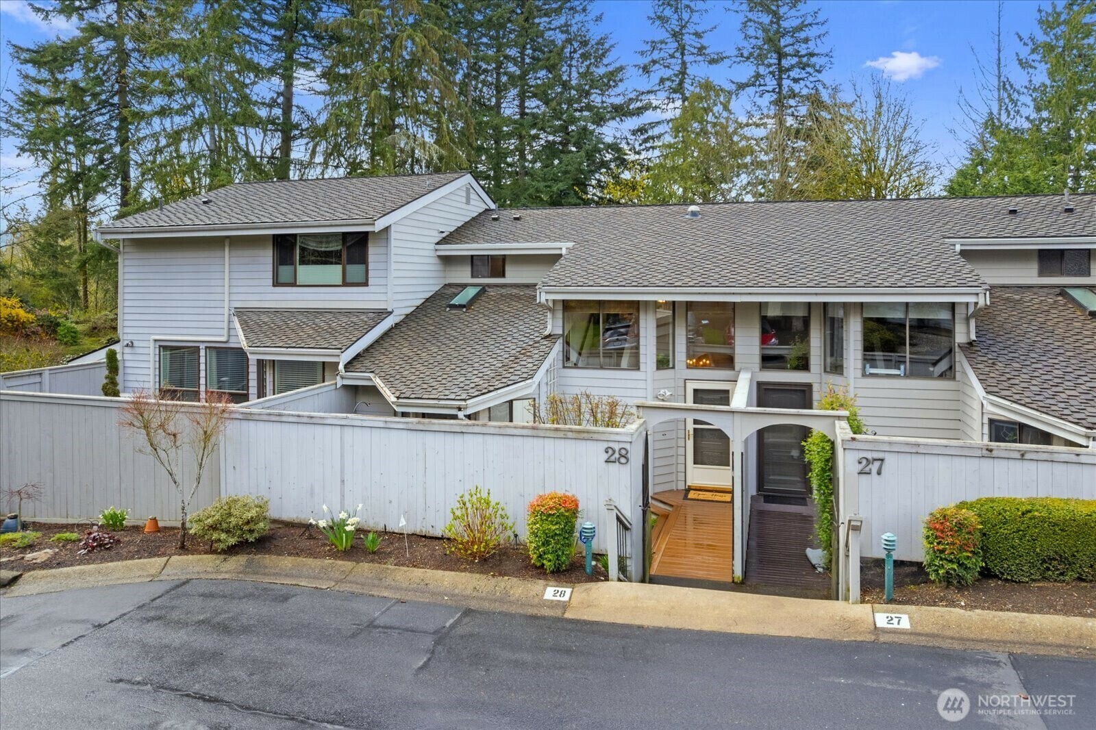 Property Photo: 15800 Village Green Drive SE 8-28 WA 98012