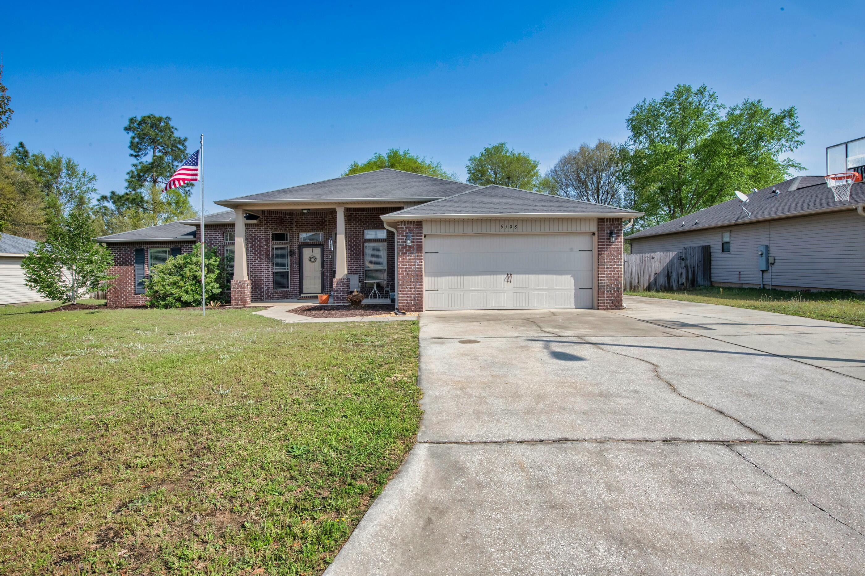 Property Photo:  6508 Fall Street  FL 32570 