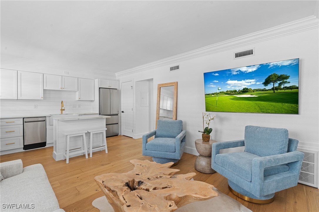 Property Photo:  980 7th Avenue S 107  FL 34102 