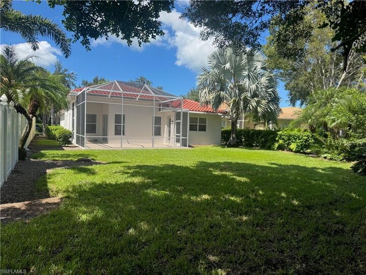 Property Photo: 14516 Sterling Oaks Dr FL 34110