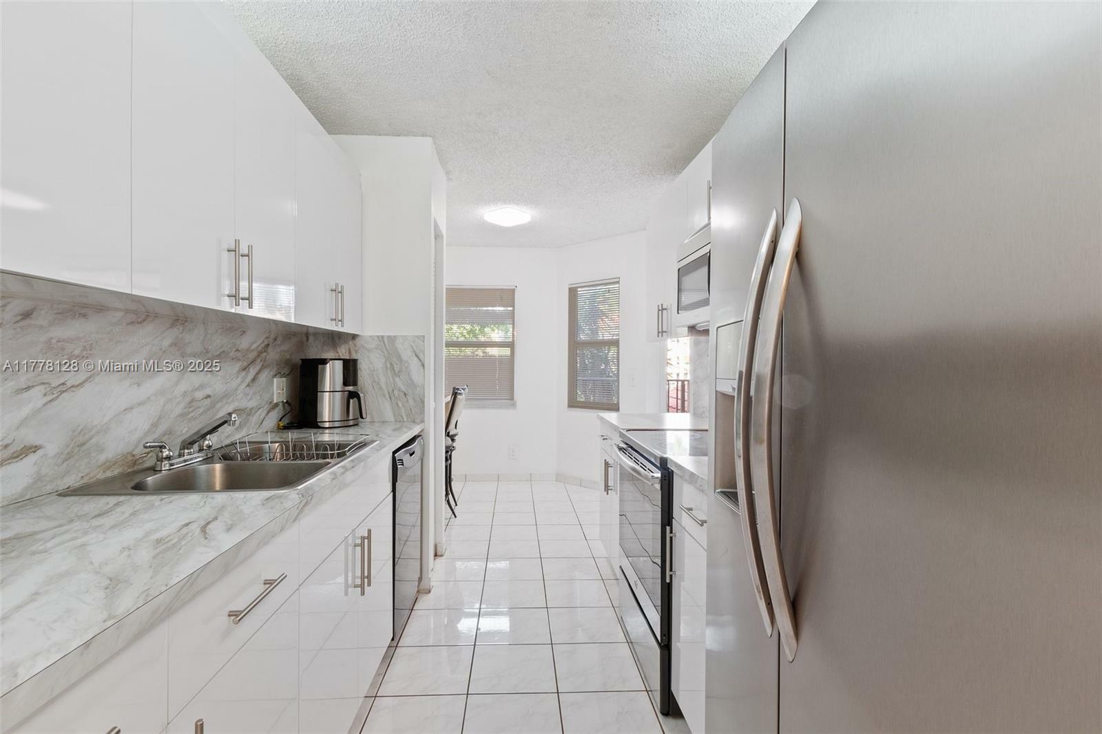 Property Photo: 1251 SW 125th Ave 211T FL 33027