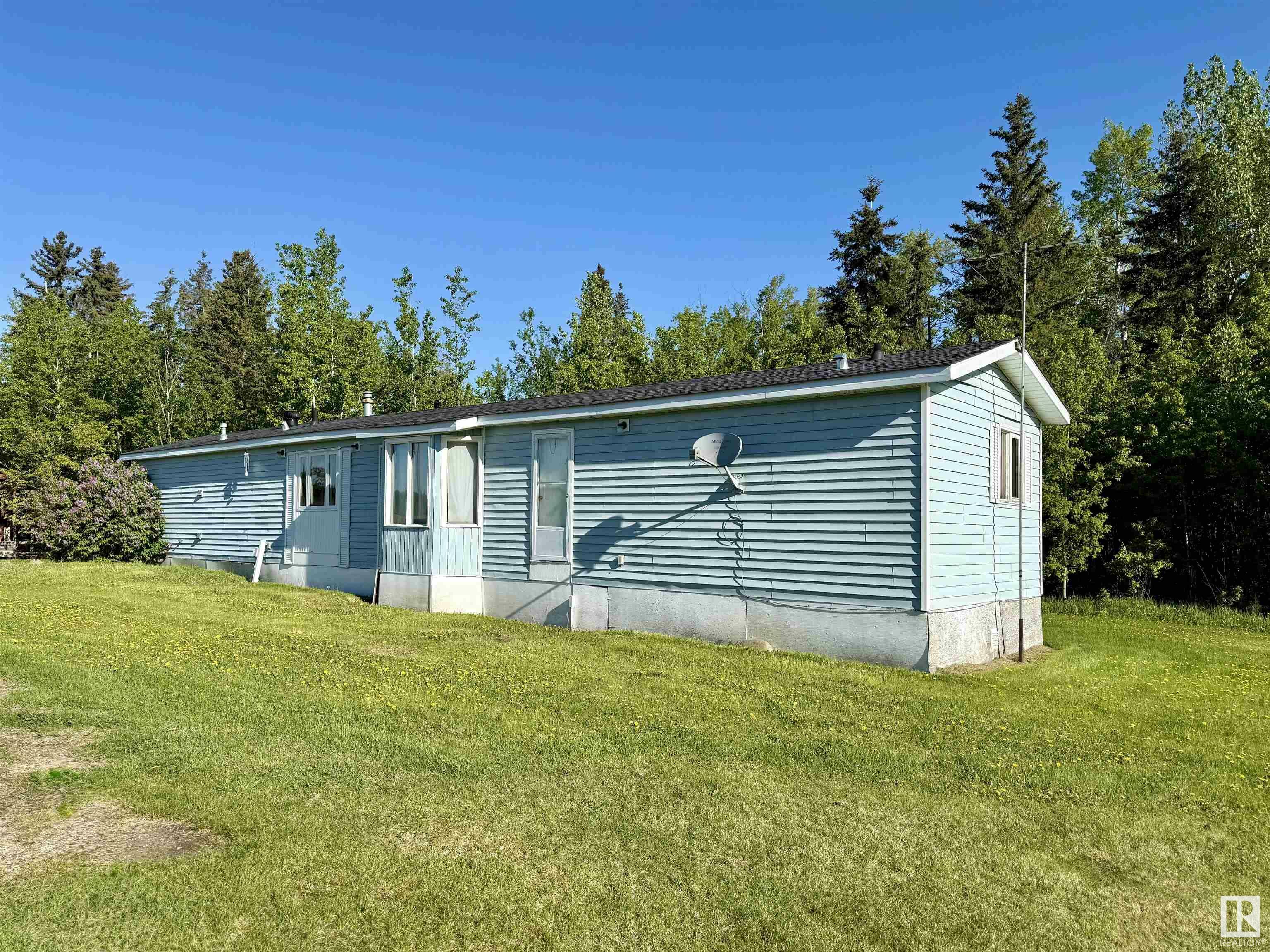 Property Photo: 53127 Range Road 93 AB T0J 1J0