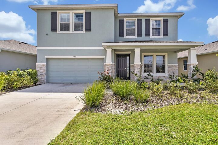 Property Photo:  5715 Woodland Sage Drive  FL 34238 