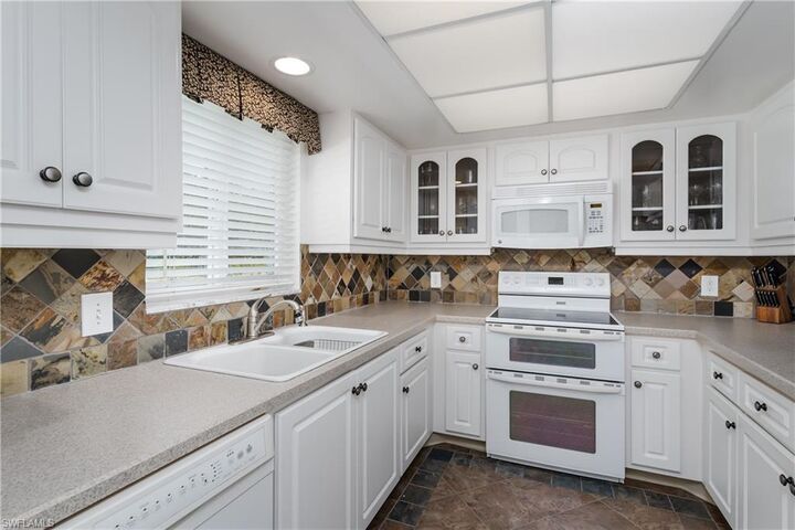 Property Photo: 5515 Rattlesnake Hammock Rd 205 FL 34113