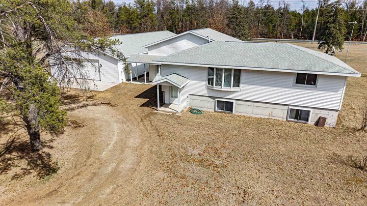 Property Photo:  N10368 Queens Way  WI 54646 