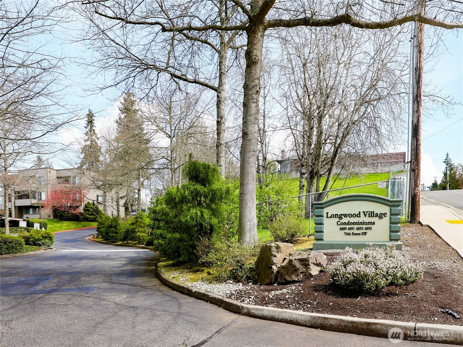 Property Photo: 4893 76th Street SW E1001 WA 98275