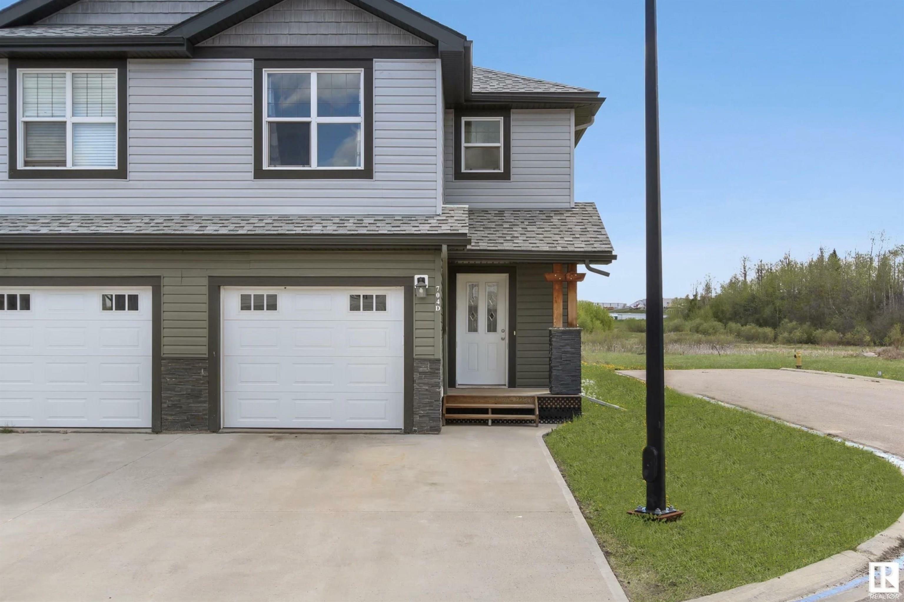 Property Photo: 704D Rocky Way AB T9M 0H3