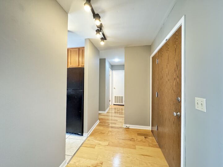 Property Photo: 5900 Oakwood Drive 4J IL 60532