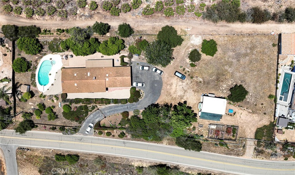 Property Photo:  9040 W Lilac Road  CA 92026 