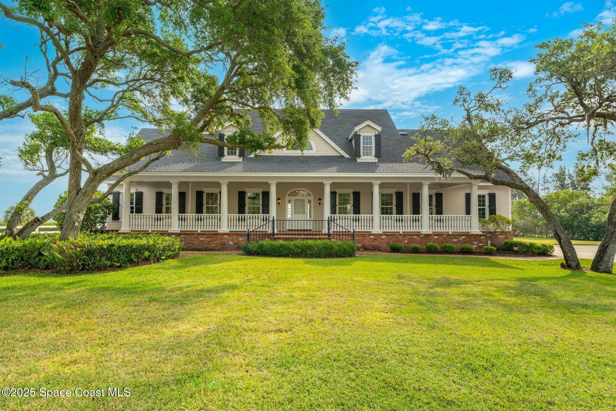 Property Photo: 9490 S Tropical Trail FL 32952