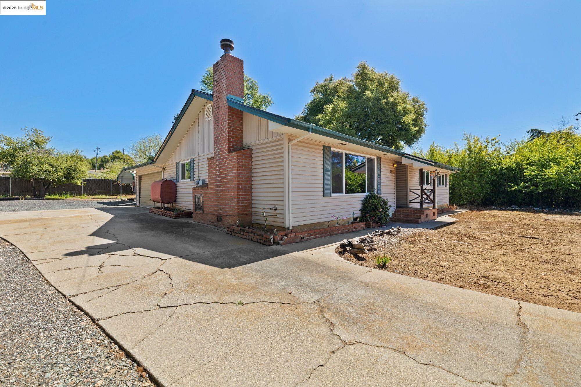 Property Photo: 20445 West Walnut Dr. CA 95370