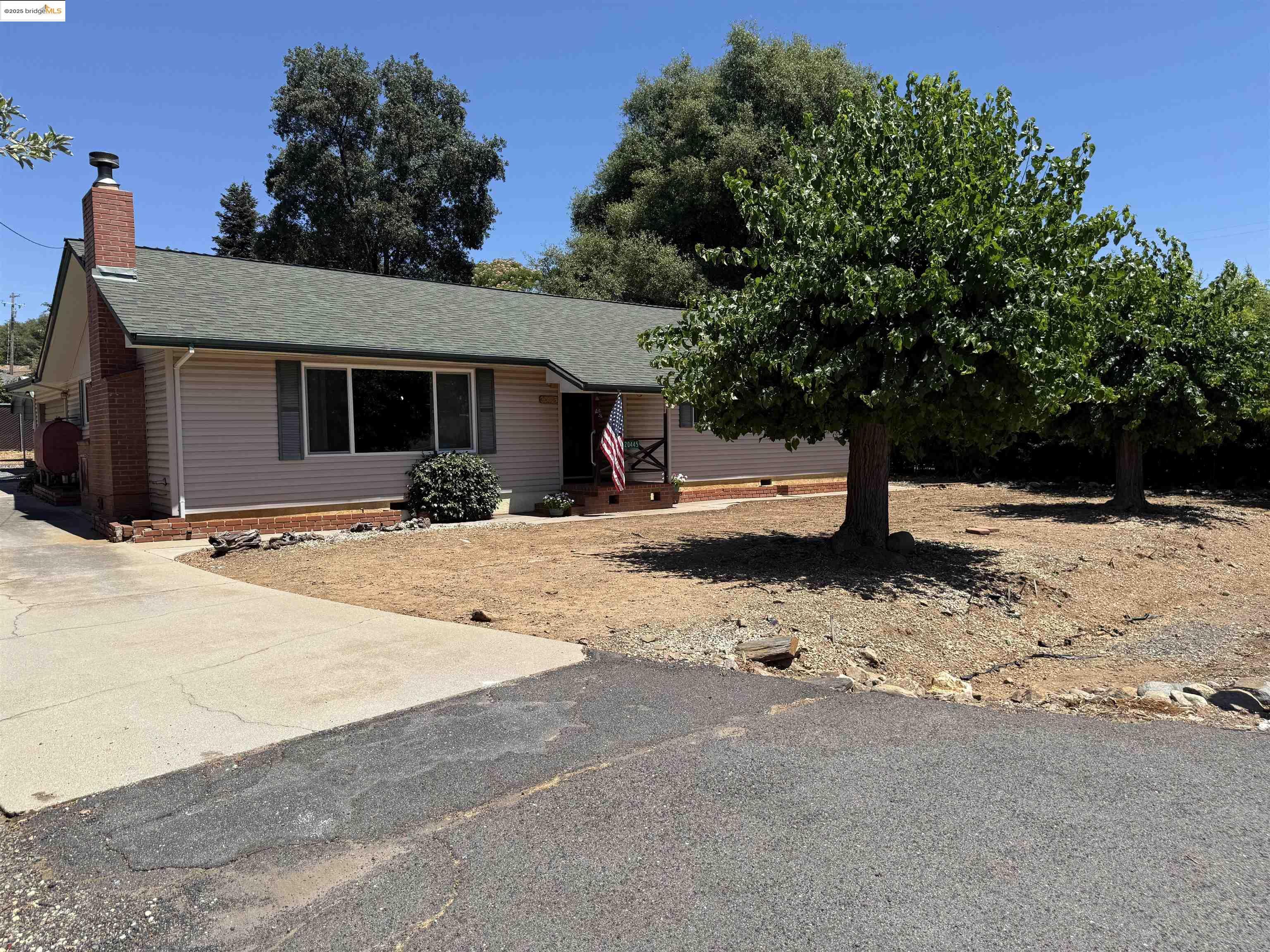 Property Photo: 20445 West Walnut Dr. CA 95370