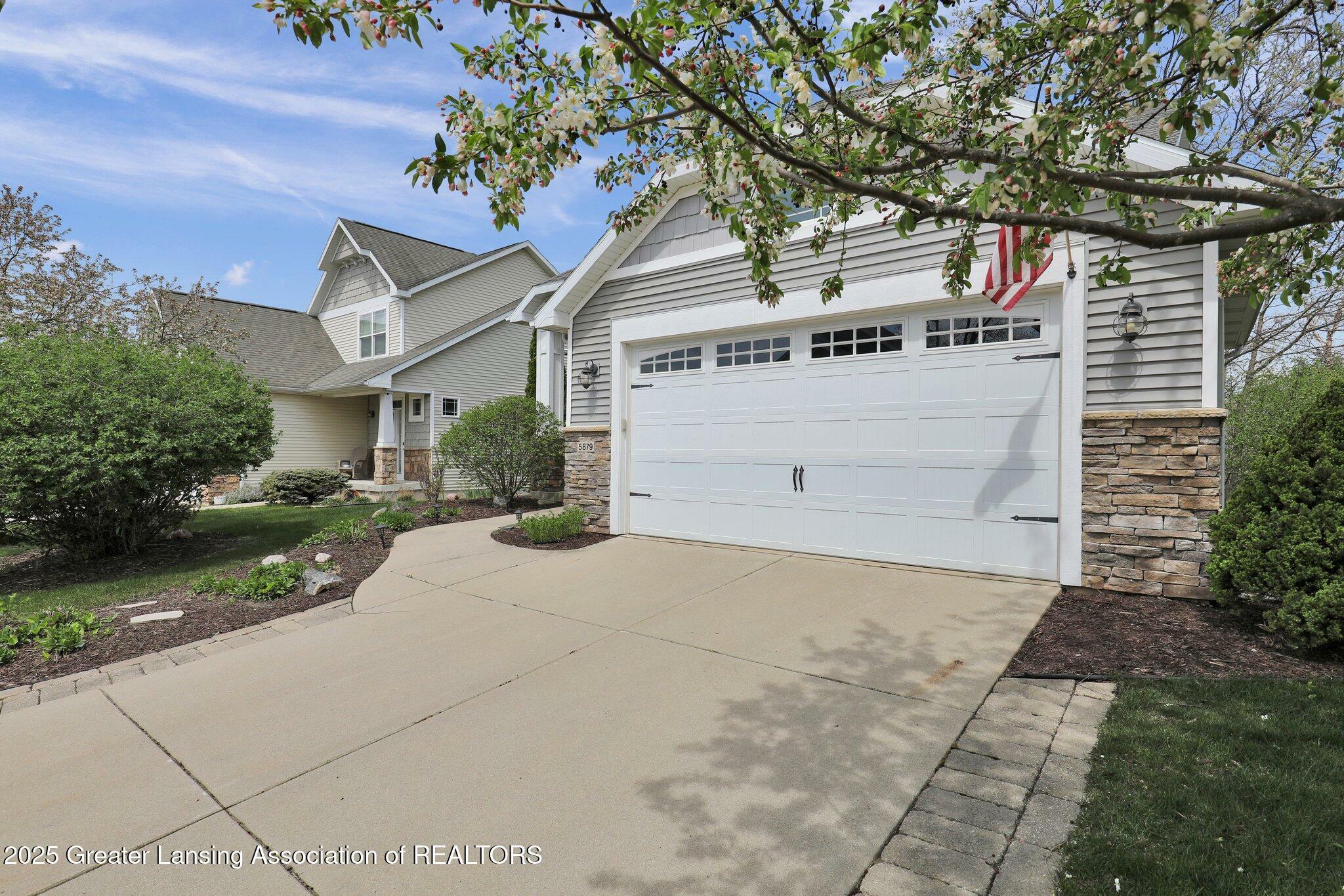 Property Photo: 5879 Chartres Way MI 48823