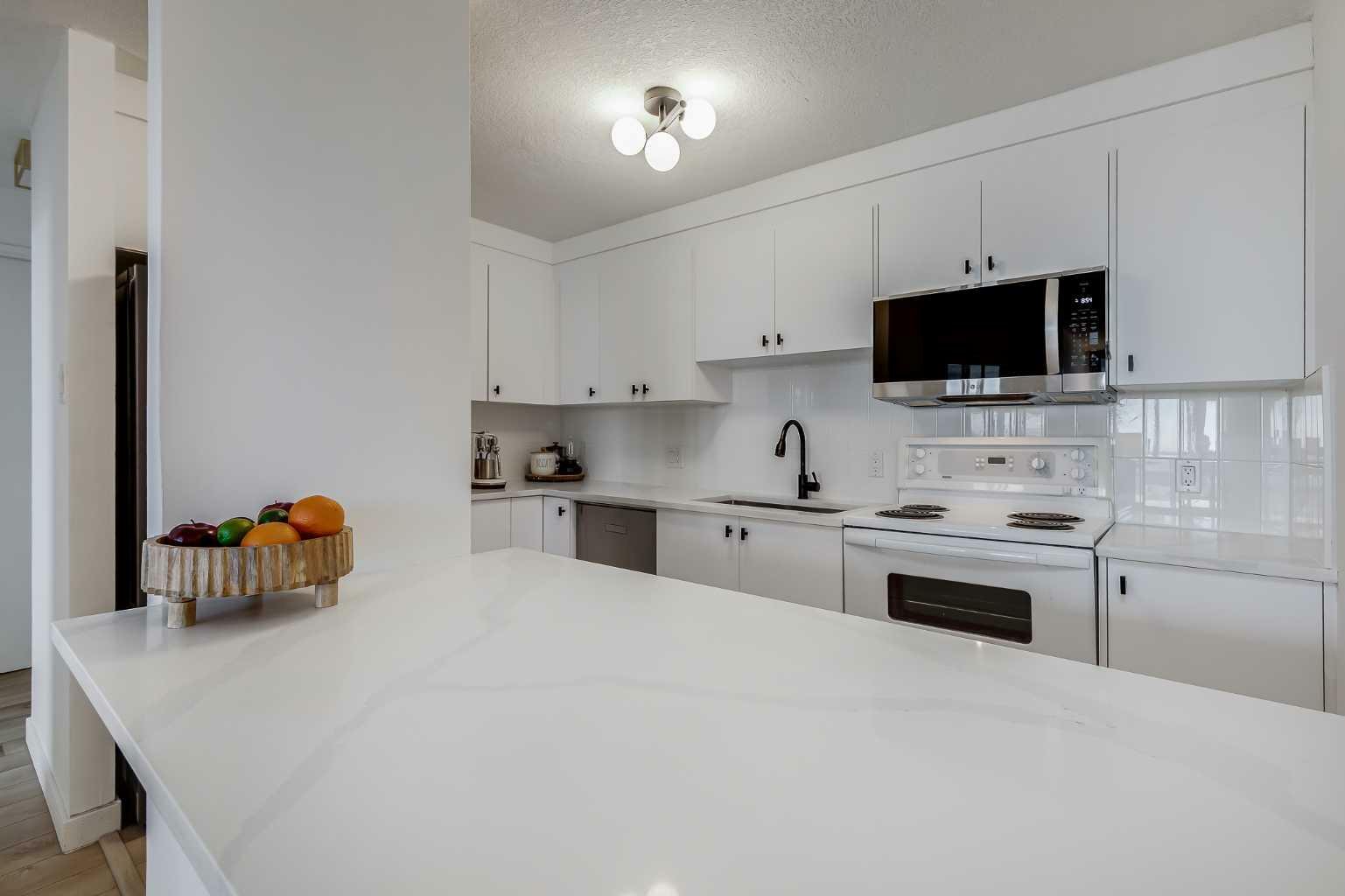 Property Photo:  1334 13 Avenue SW 1006  AB T3C 3S2 