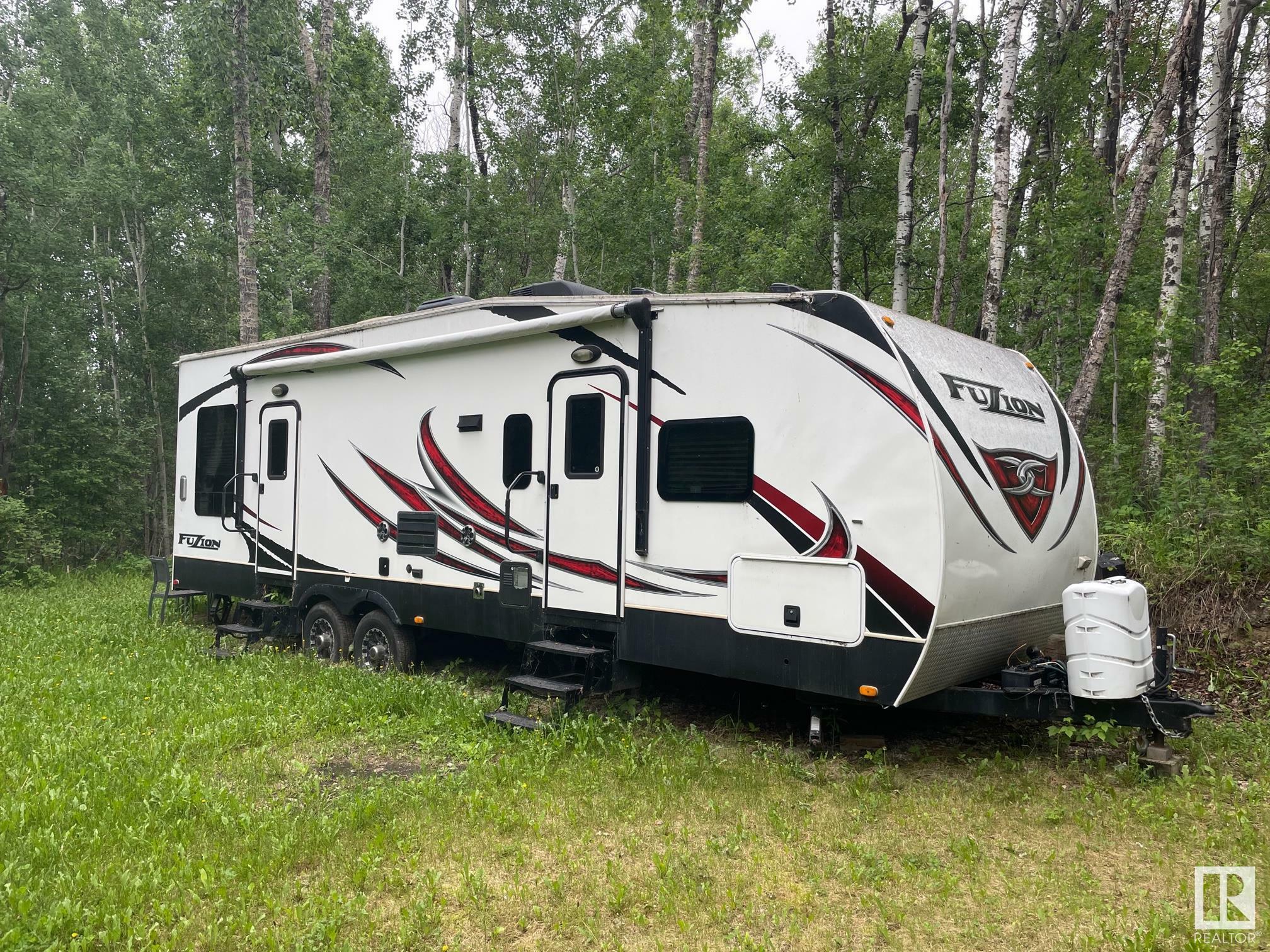 Property Photo: 4-52111 Rr25 AB T7Y 3L8