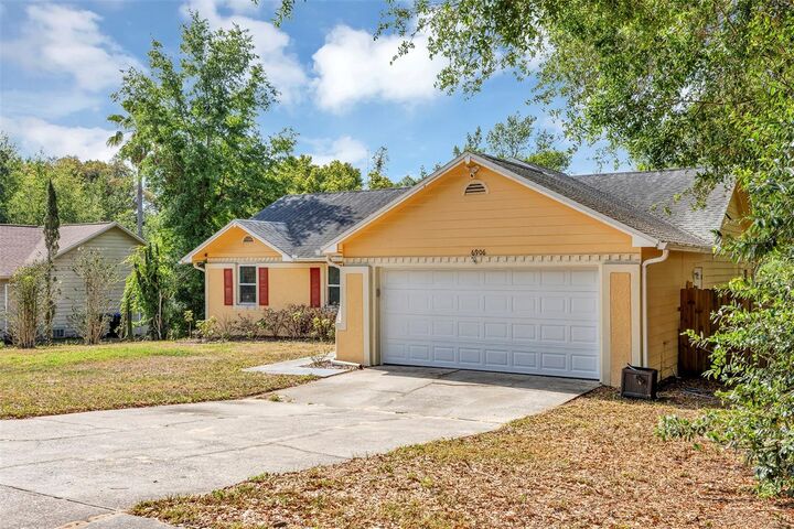 Property Photo:  6906 Colony Oaks Lane  FL 32818 