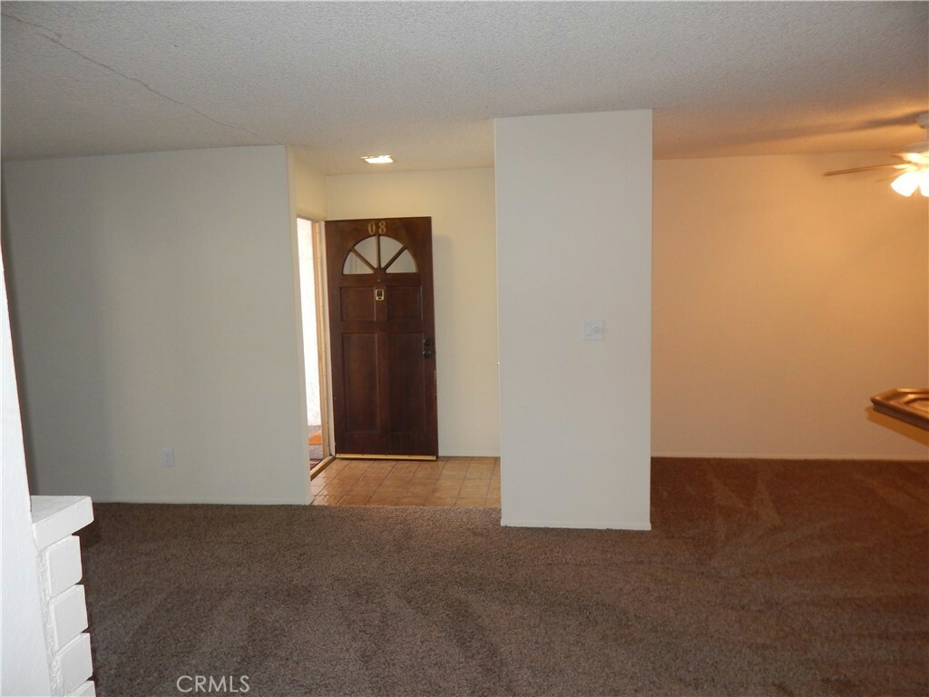 Property Photo: 17552 Vandenberg Lane 8 CA 92780