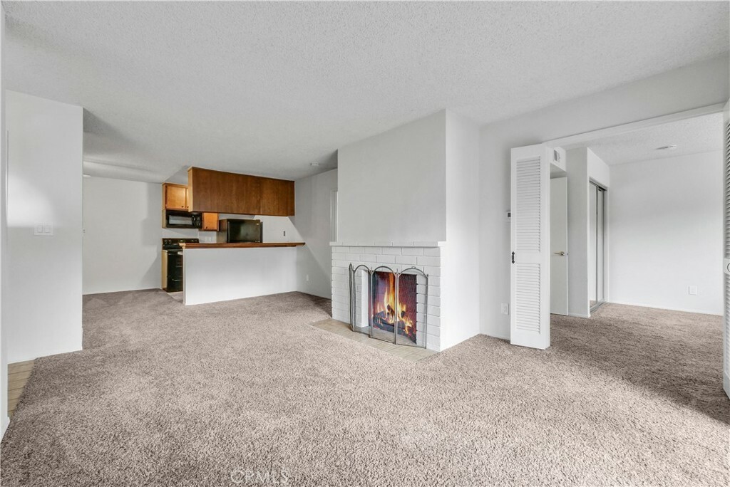 Property Photo: 17552 Vandenberg Lane 8 CA 92780