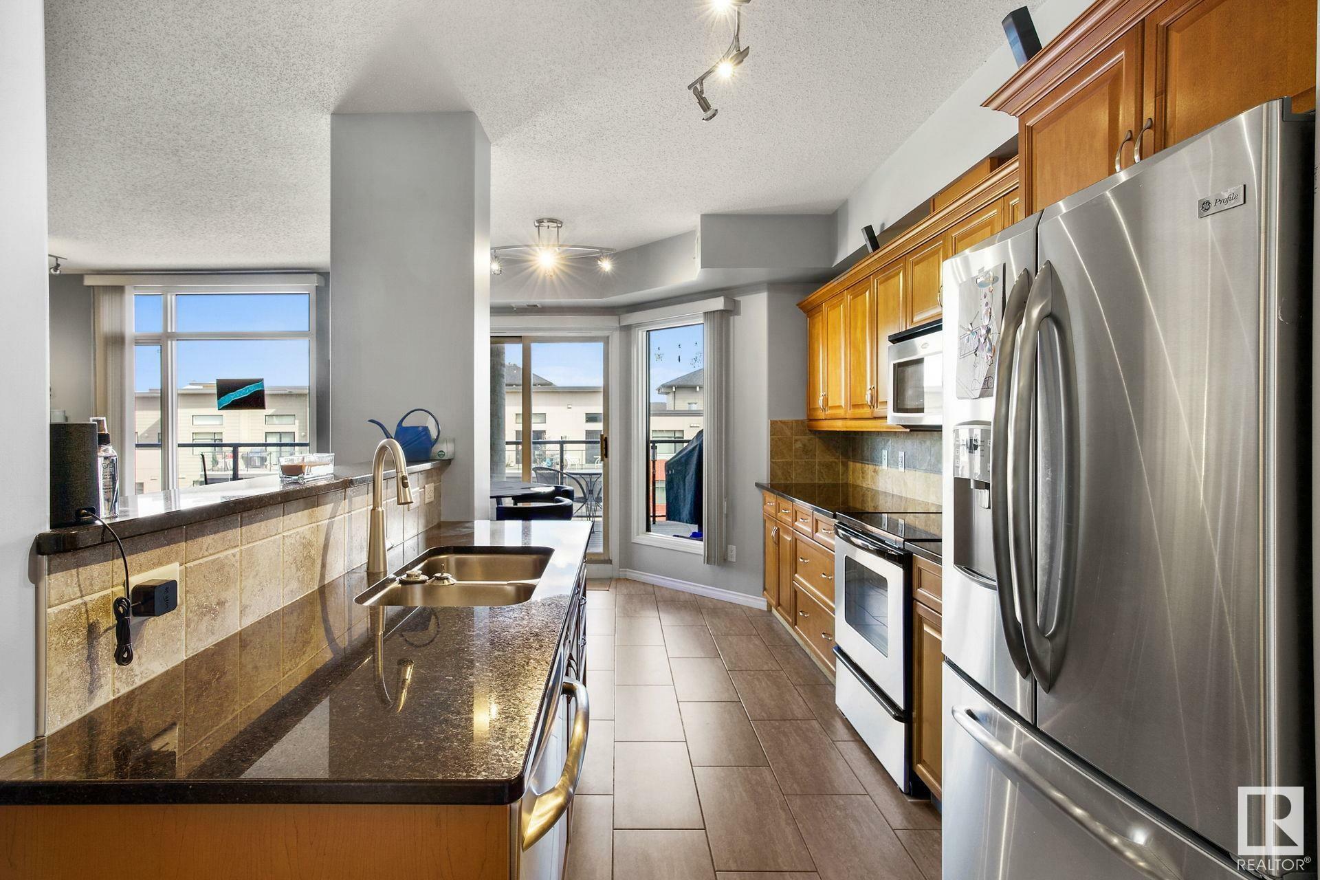 Property Photo: 141 Festival Way 501 AB T8A 3V8