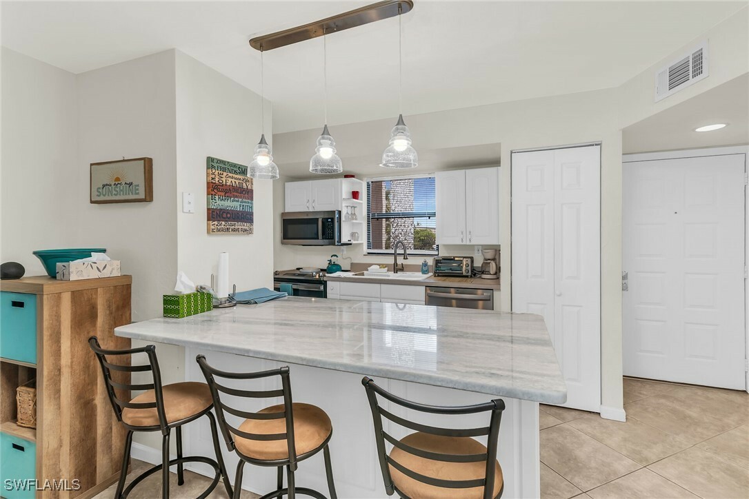 Property Photo: 1011 Anglers Cove H205 FL 34145