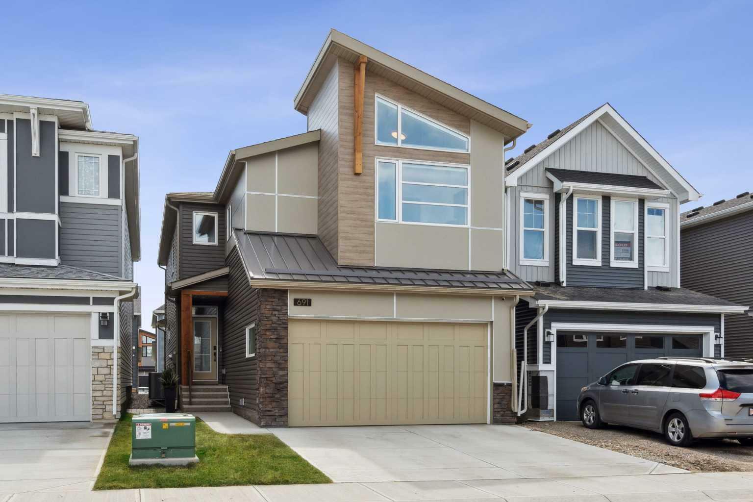 Property Photo: 691 Creekstone Circle SW AB T2X 4Y6