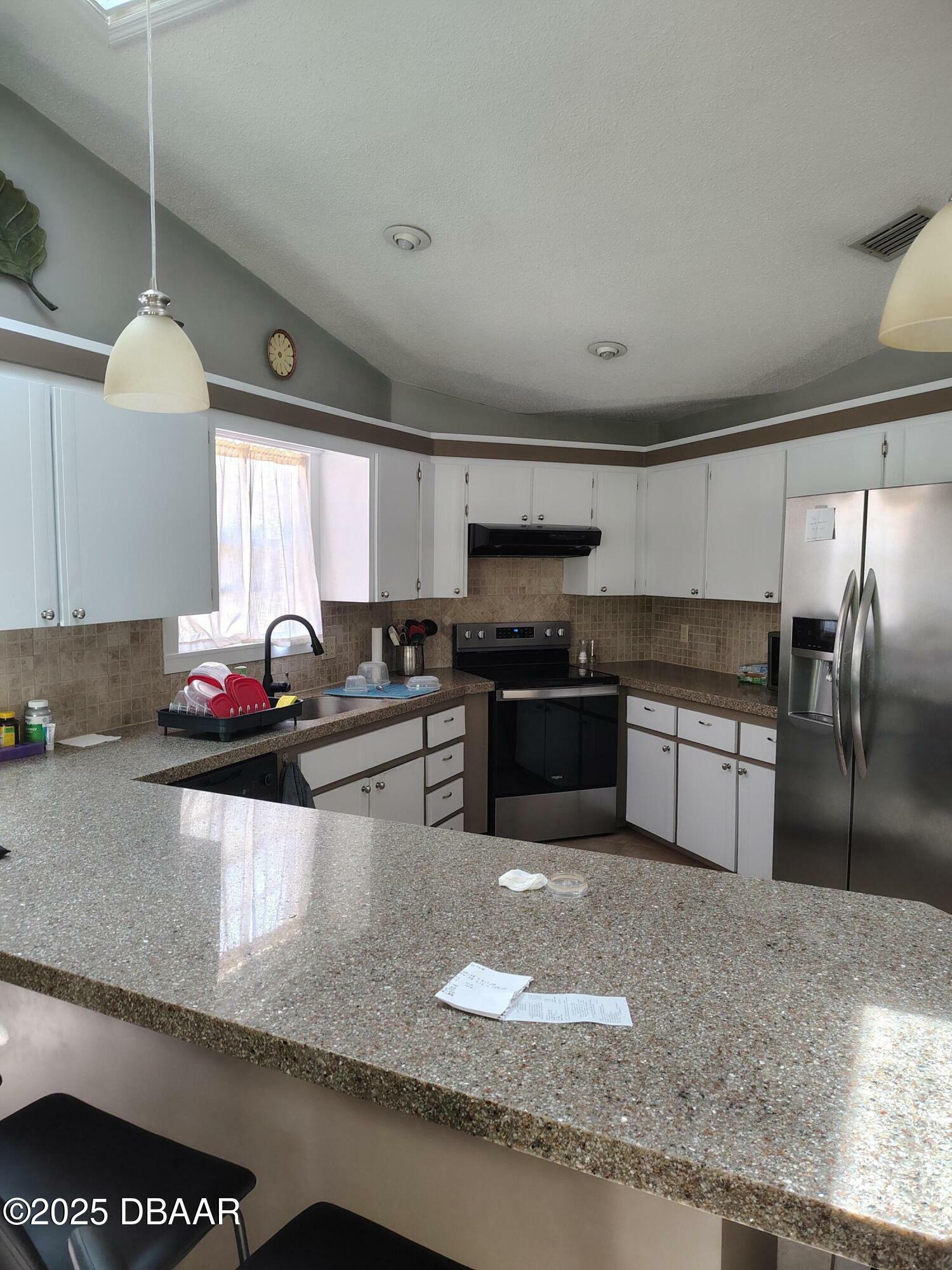 Property Photo: 5 Woodgate Court FL 32174
