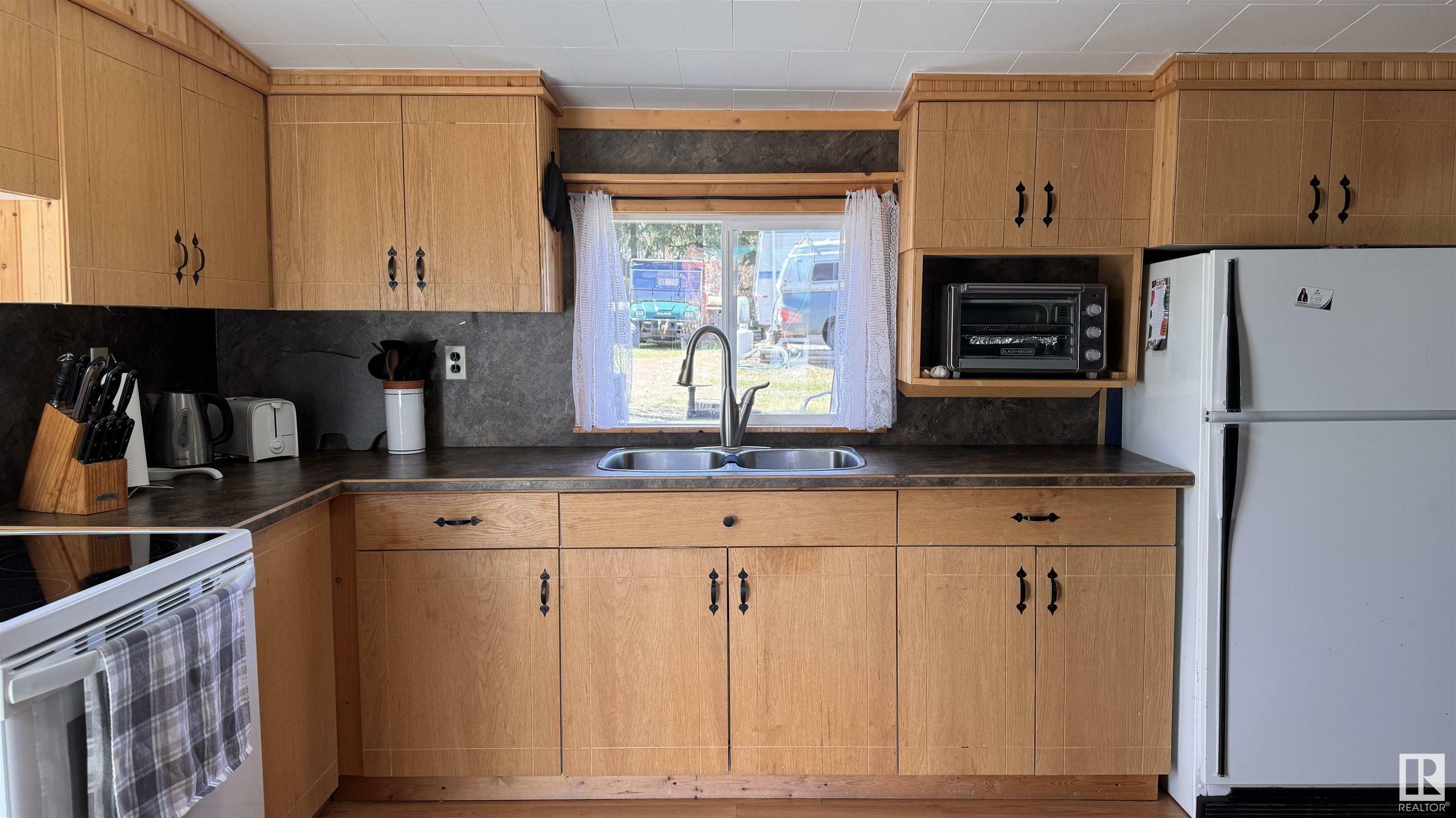 Property Photo: 310, 11121 Twp Rd 595 AB T0A 0C0