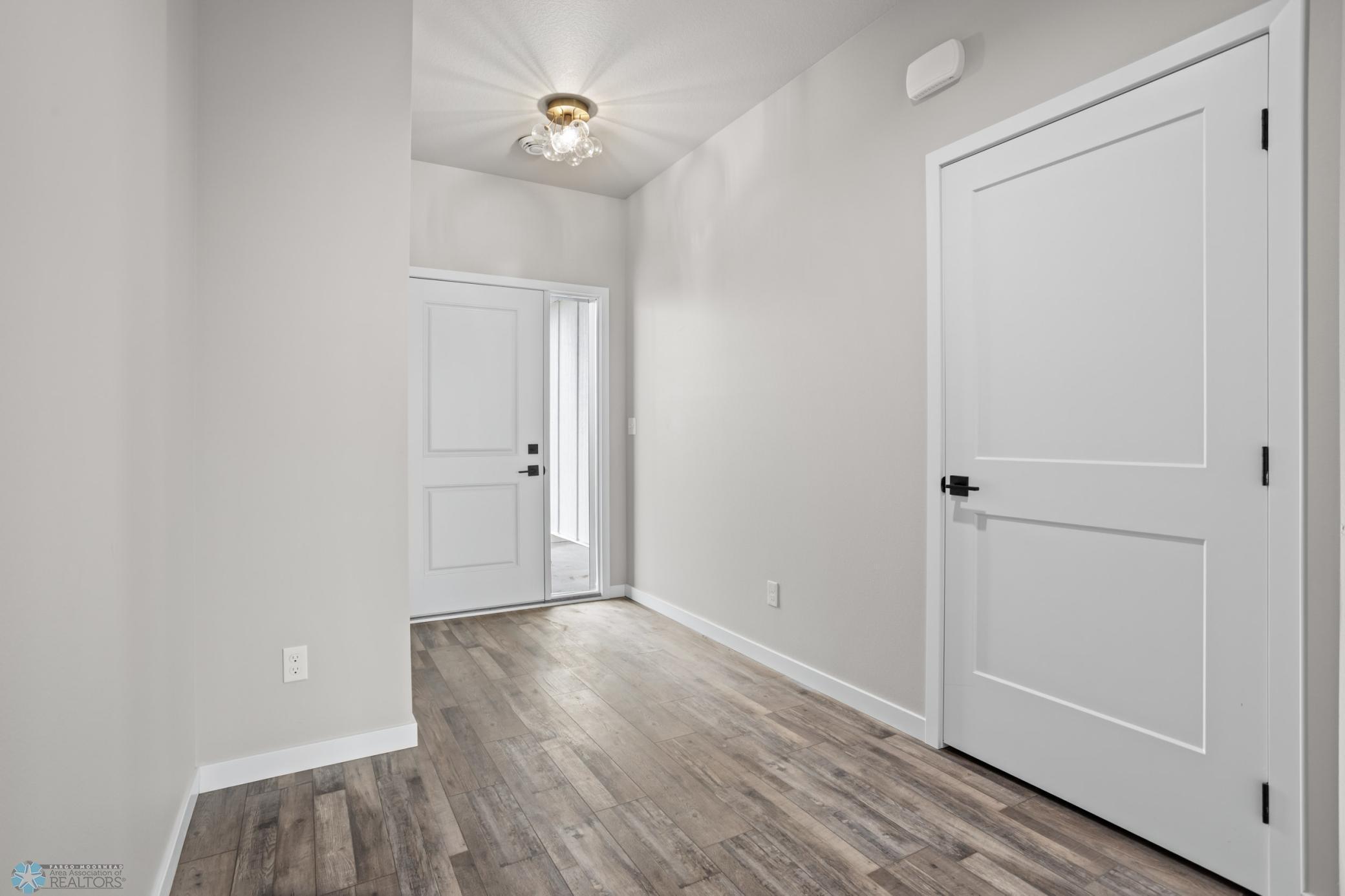 Property Photo: 202 Neuman Boulevard ND 58018