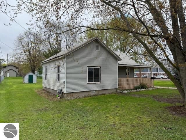 Property Photo:  219 S Bankson  MI 48880