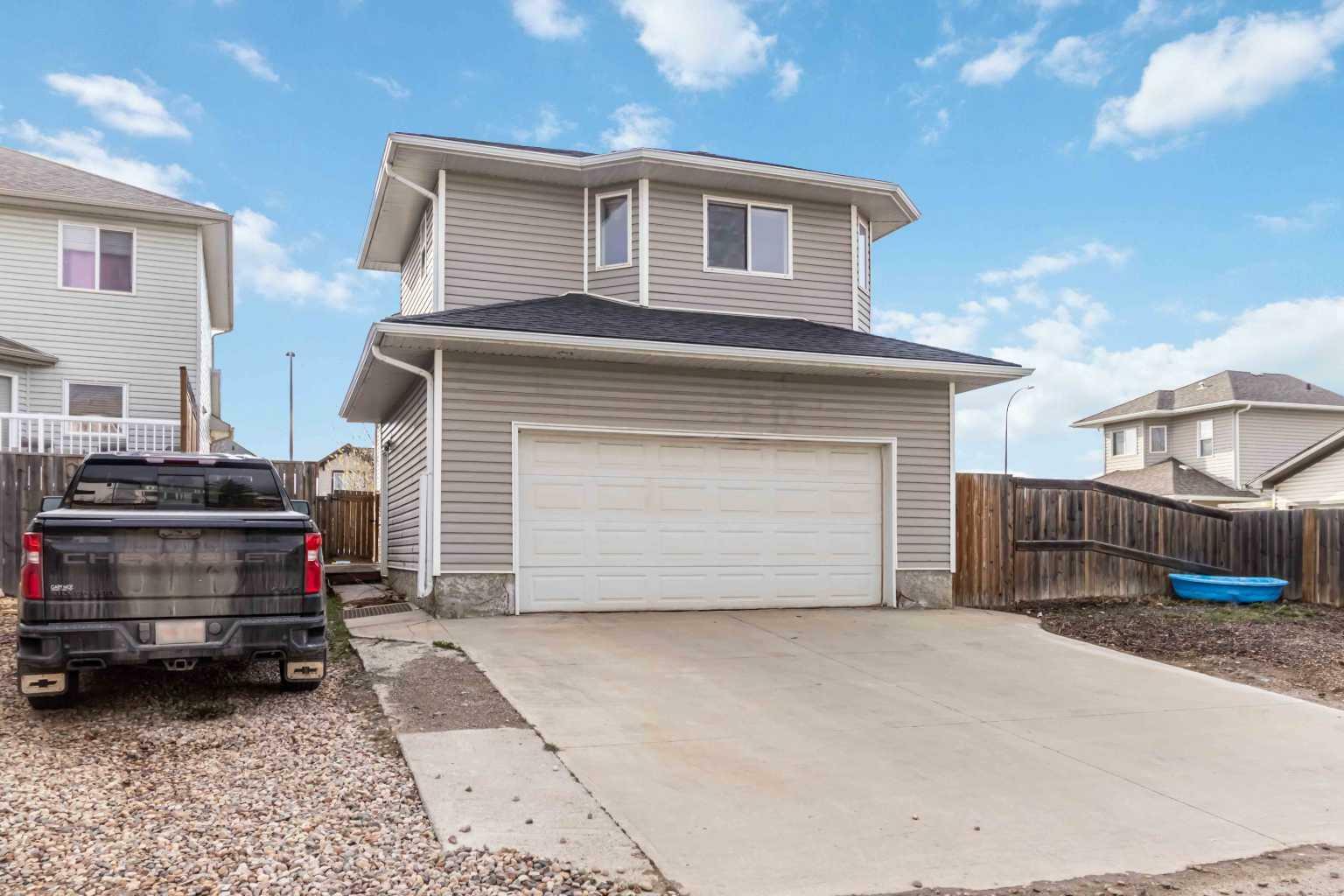 Property Photo: 101 Sparrow Hawk Drive AB T9K 0L4