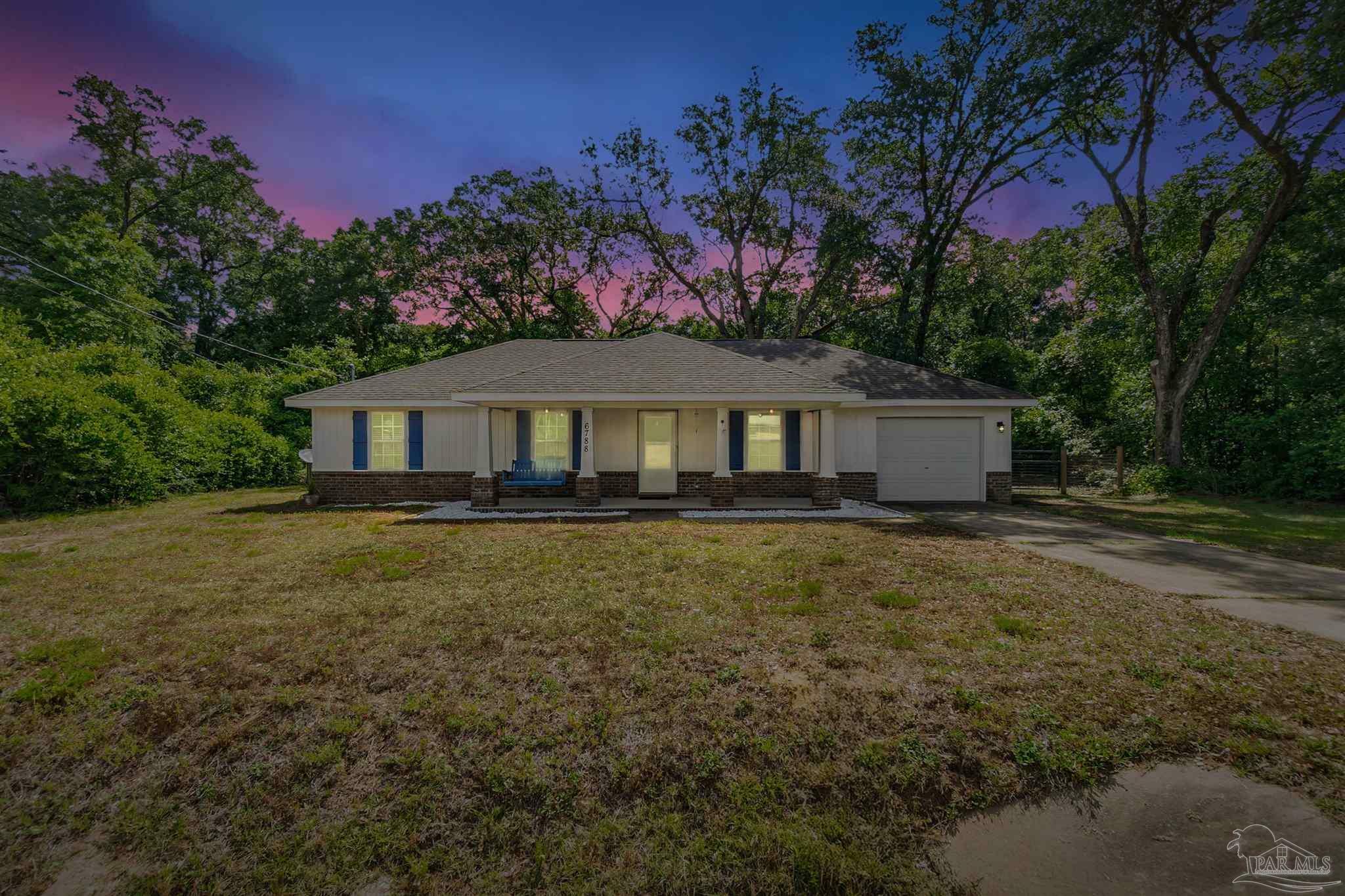 Property Photo: 6788 Contentment St FL 32583