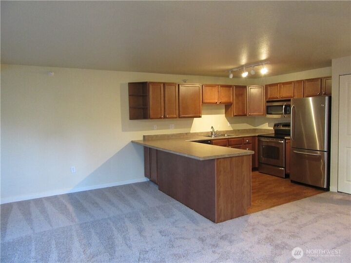 Property Photo:  700  Front Street S B104  WA 98027 