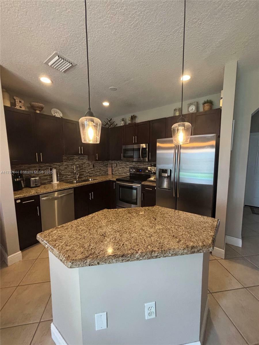 Property Photo: 12937 SW 29th St FL 33027