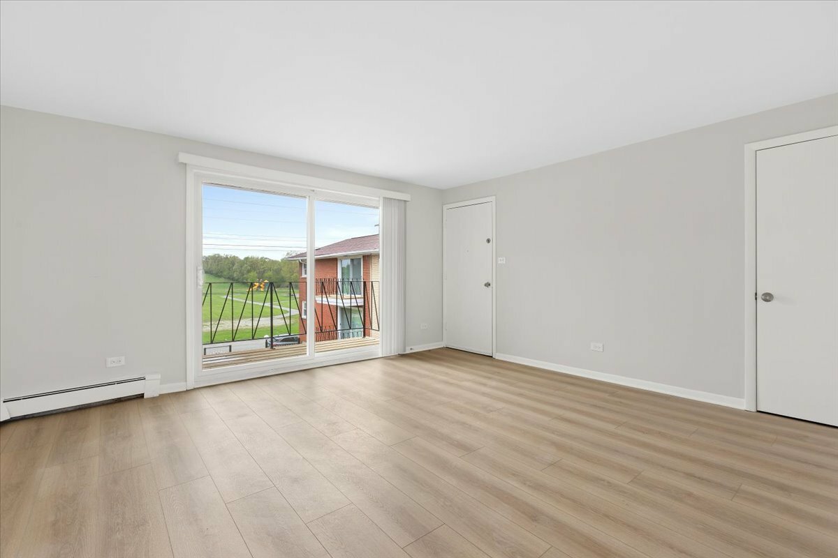 Property Photo: 14121 S Stewart Avenue 1A IL 60827
