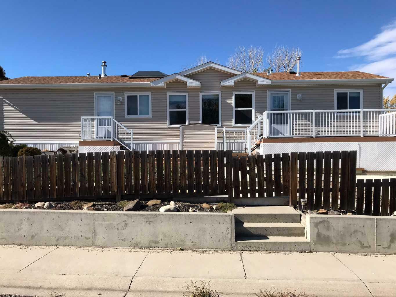 Property Photo: 208 2A Street W AB T0K 0N0