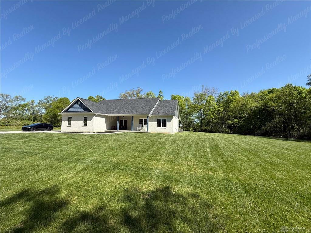 Property Photo: 8219 Wind Dancer Drive OH 45327