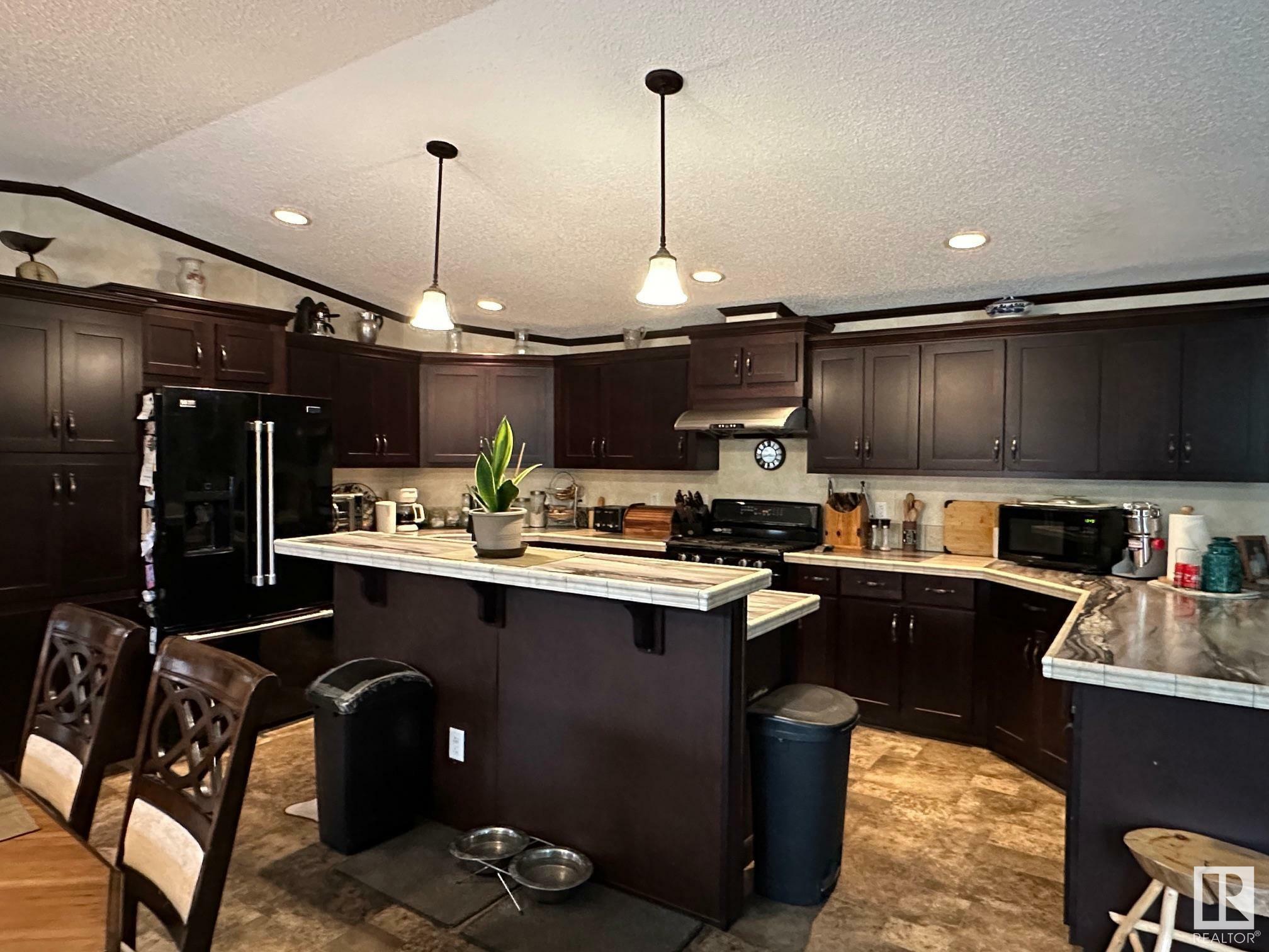 Property Photo: 63308 Rge Rd 433 AB T9M 1P3