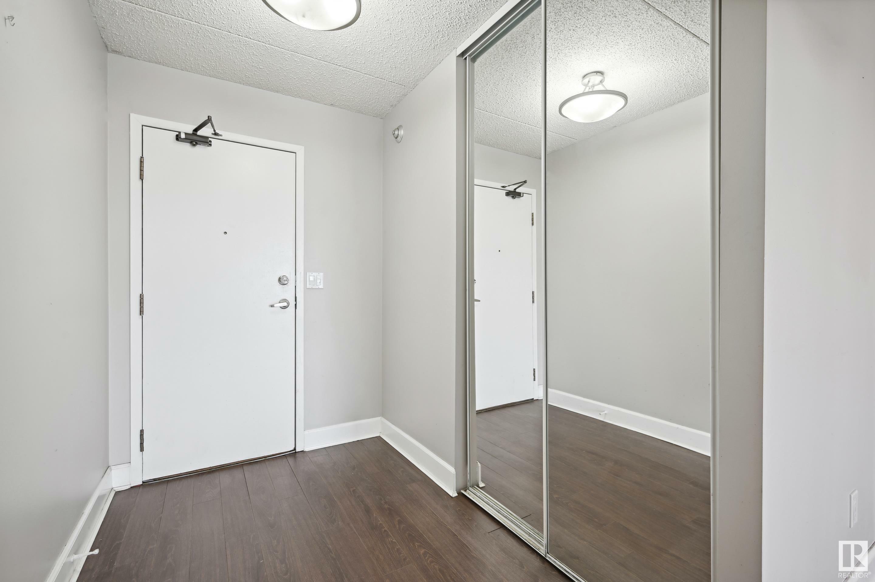 Property Photo: 9917 110 Street NW 1103 AB T5K 2N4