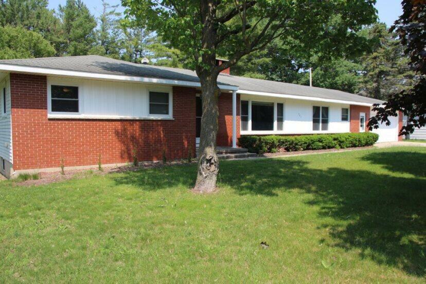 Property Photo:  567 Long Rapids Road  MI 49707 