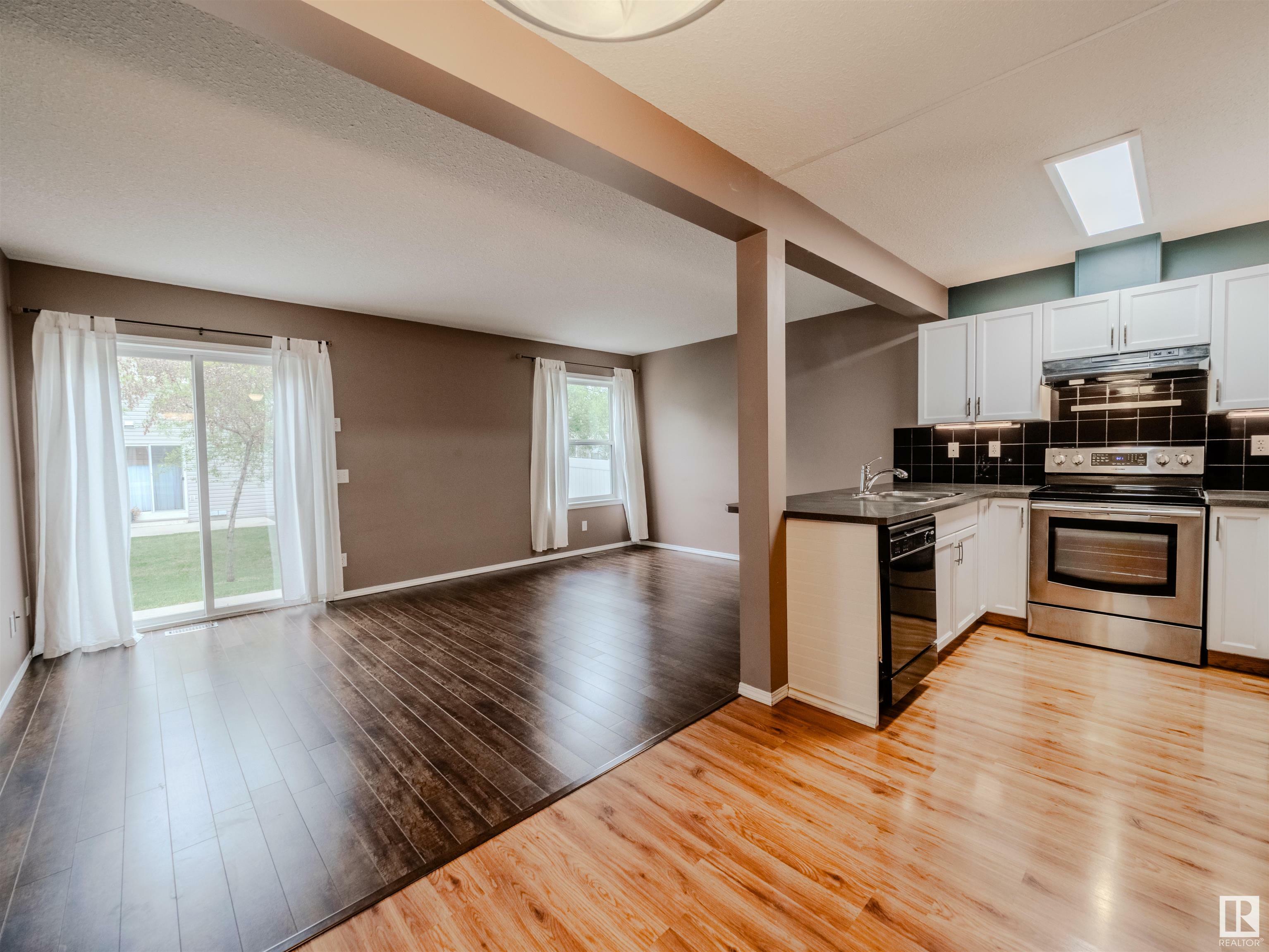Property Photo: 230 Edwards Drive SW 66 AB T6X 1G7
