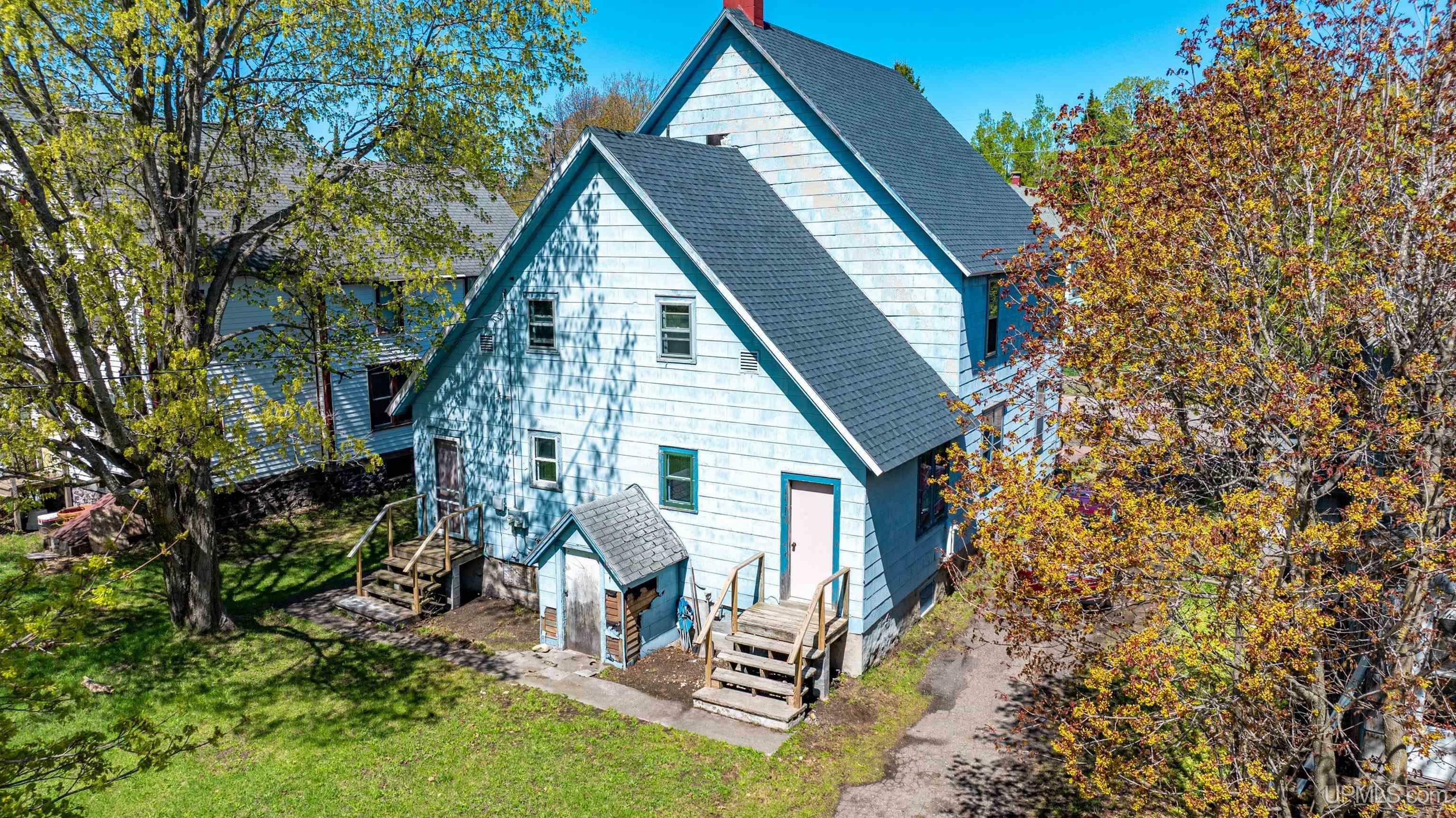 Property Photo:  118 S Tamarack Street  MI 49913 